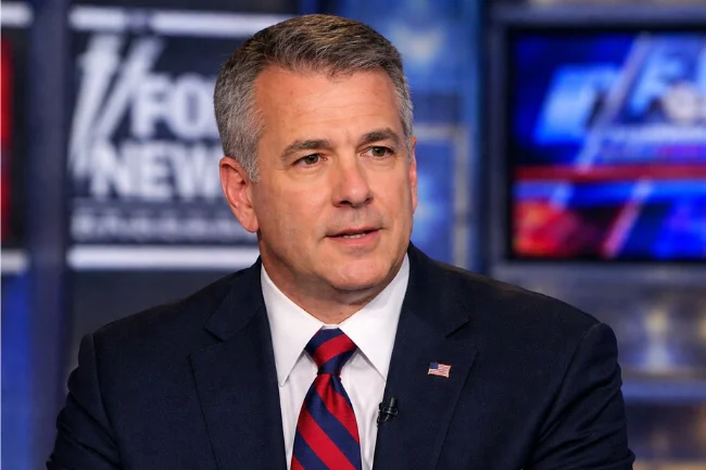 Paul J Mauro appearing as a legal and security analyst during a television news broadcast