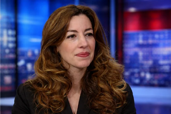 Kristy Greenberg speaking as a legal analyst in a professional media studio setting